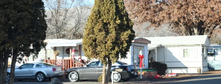 Cars parked by mobile homes