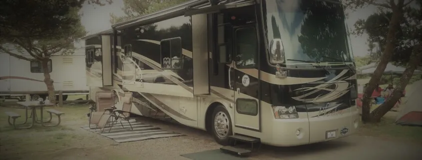 Luxury RV parked at a campsite